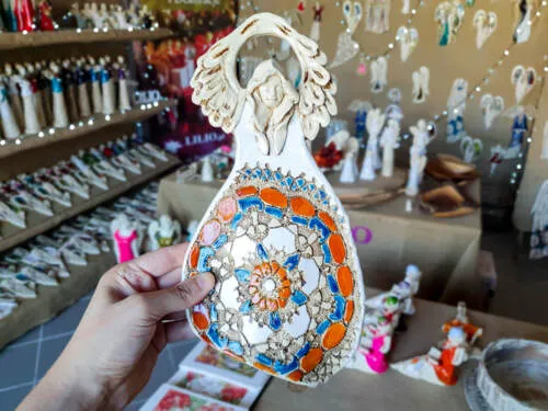 Figurka anioła obfitości - biały pomarańcz niebieski -  31 x 16 cm figurka dekoracyjna